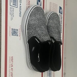 Vans women Black and White Patterned Slip-On Sneakers